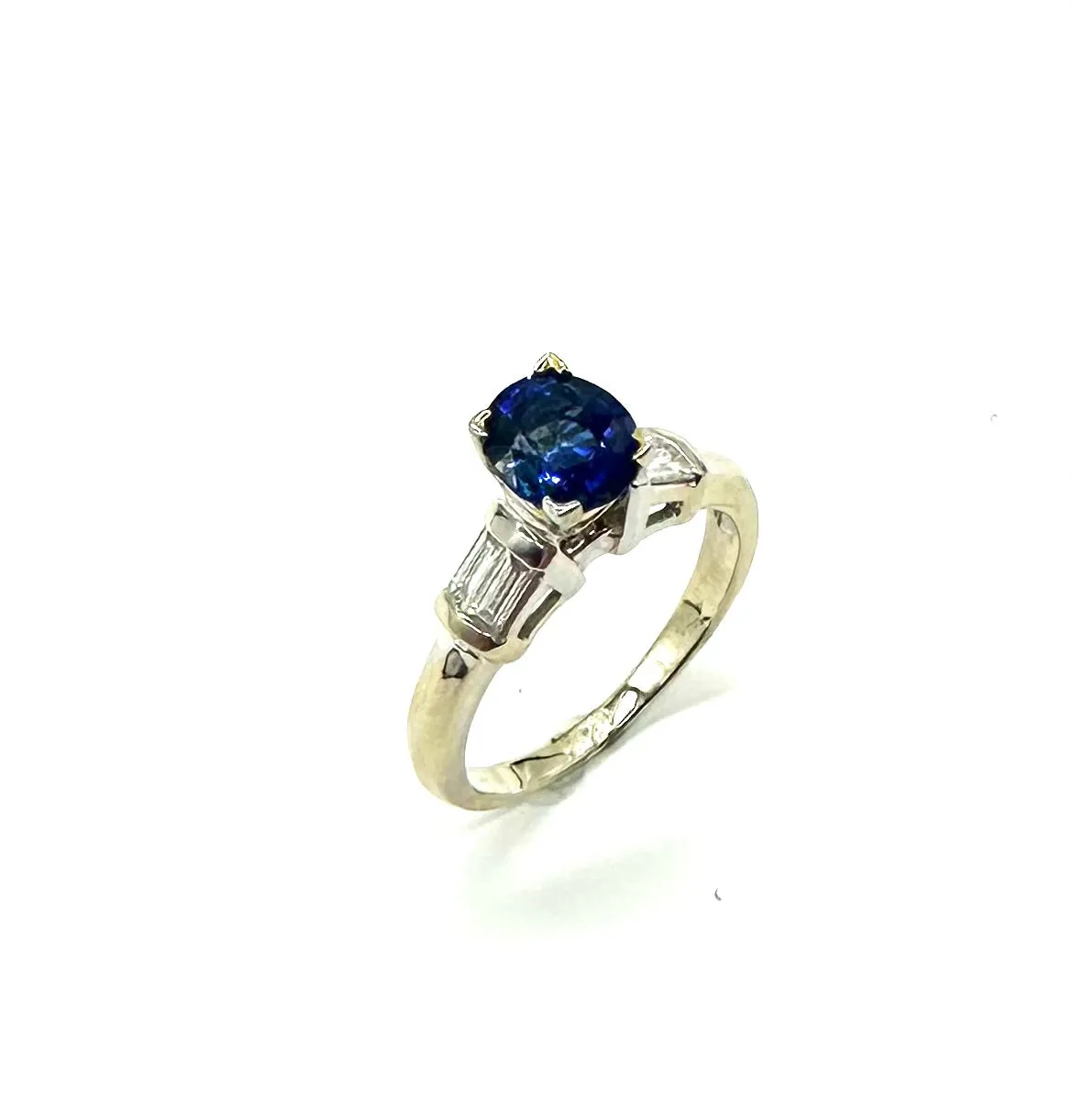 1.34 CTW Oval Sapphire W/ 50 PTW Diamond Ring