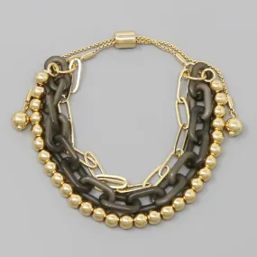 Acetate Link Triple Strand Bracelet