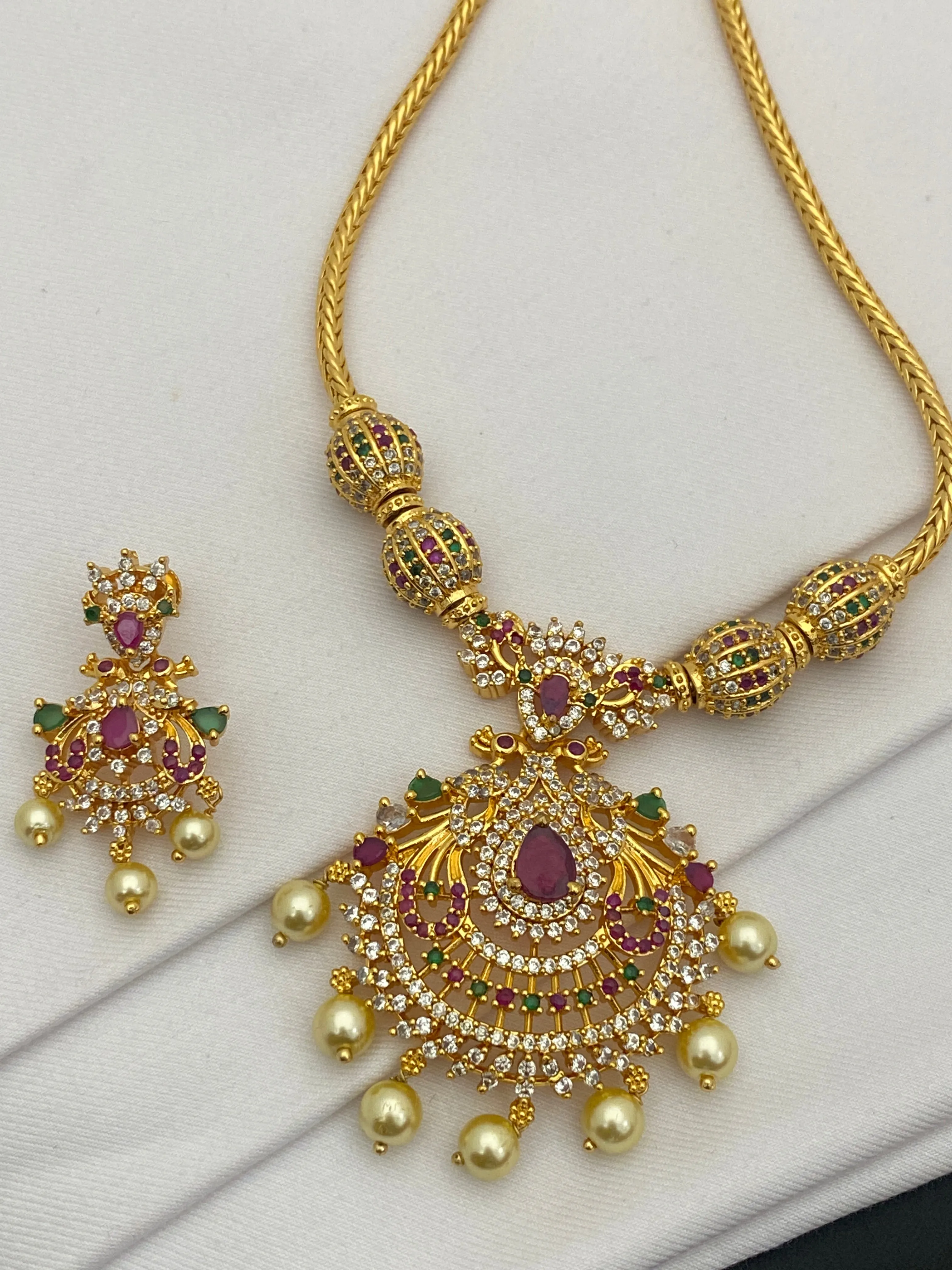 Dazzling Gold Plated Peacock Designer Chain And Earring Set With Multi Color