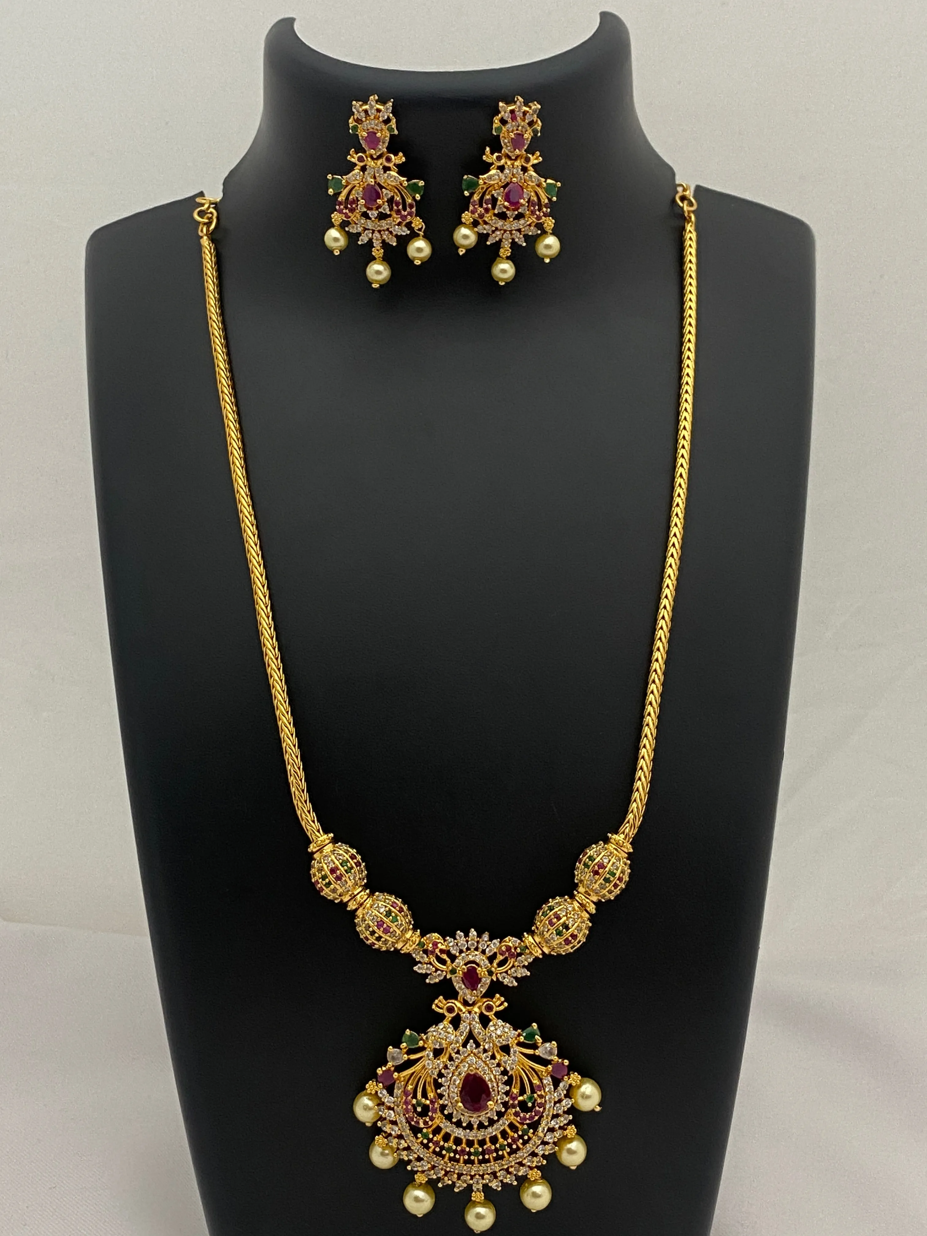 Dazzling Gold Plated Peacock Designer Chain And Earring Set With Multi Color